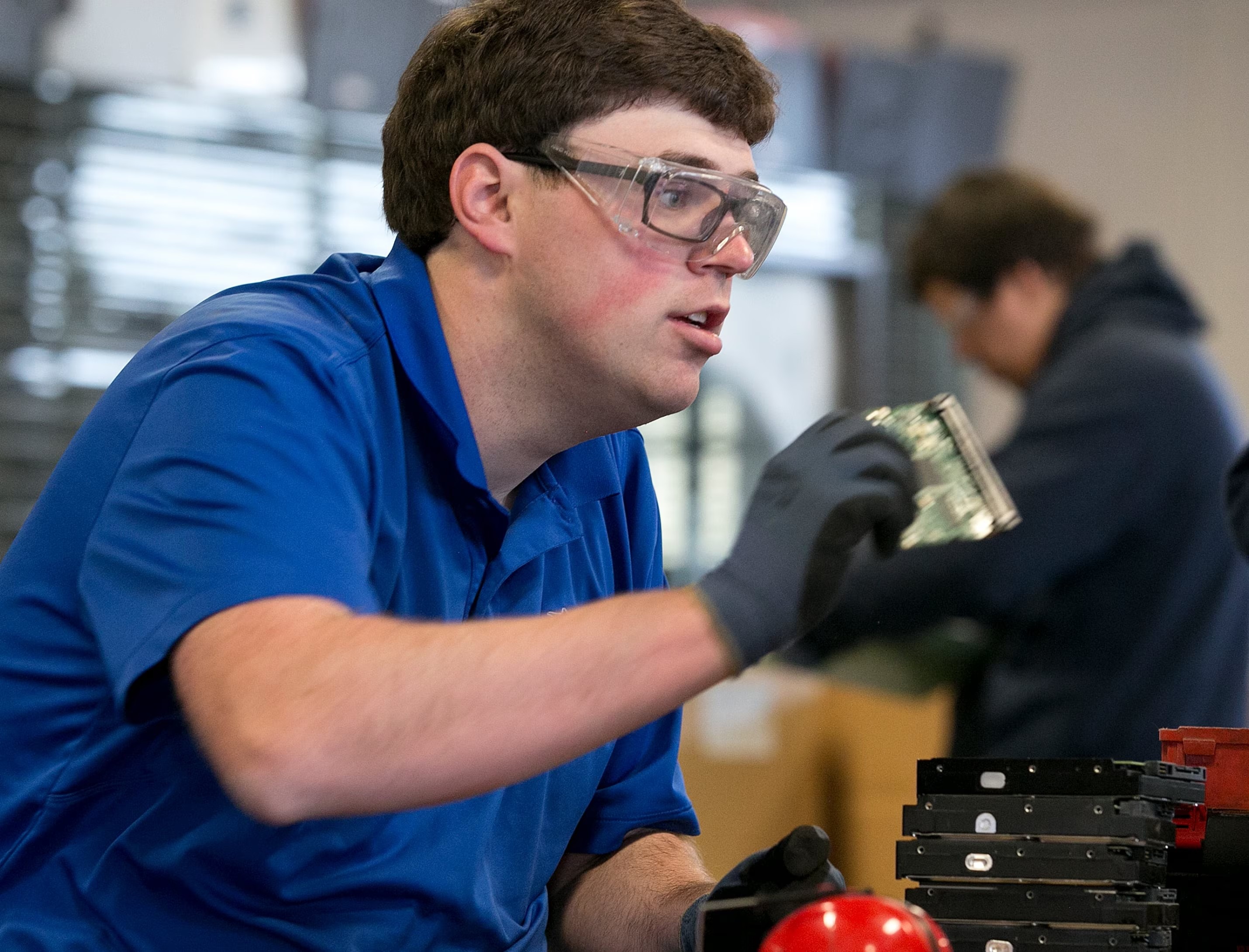 Man working with goggles on.